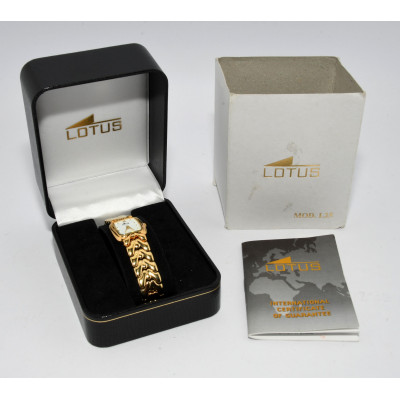 RELOJ LOTUS DORADO