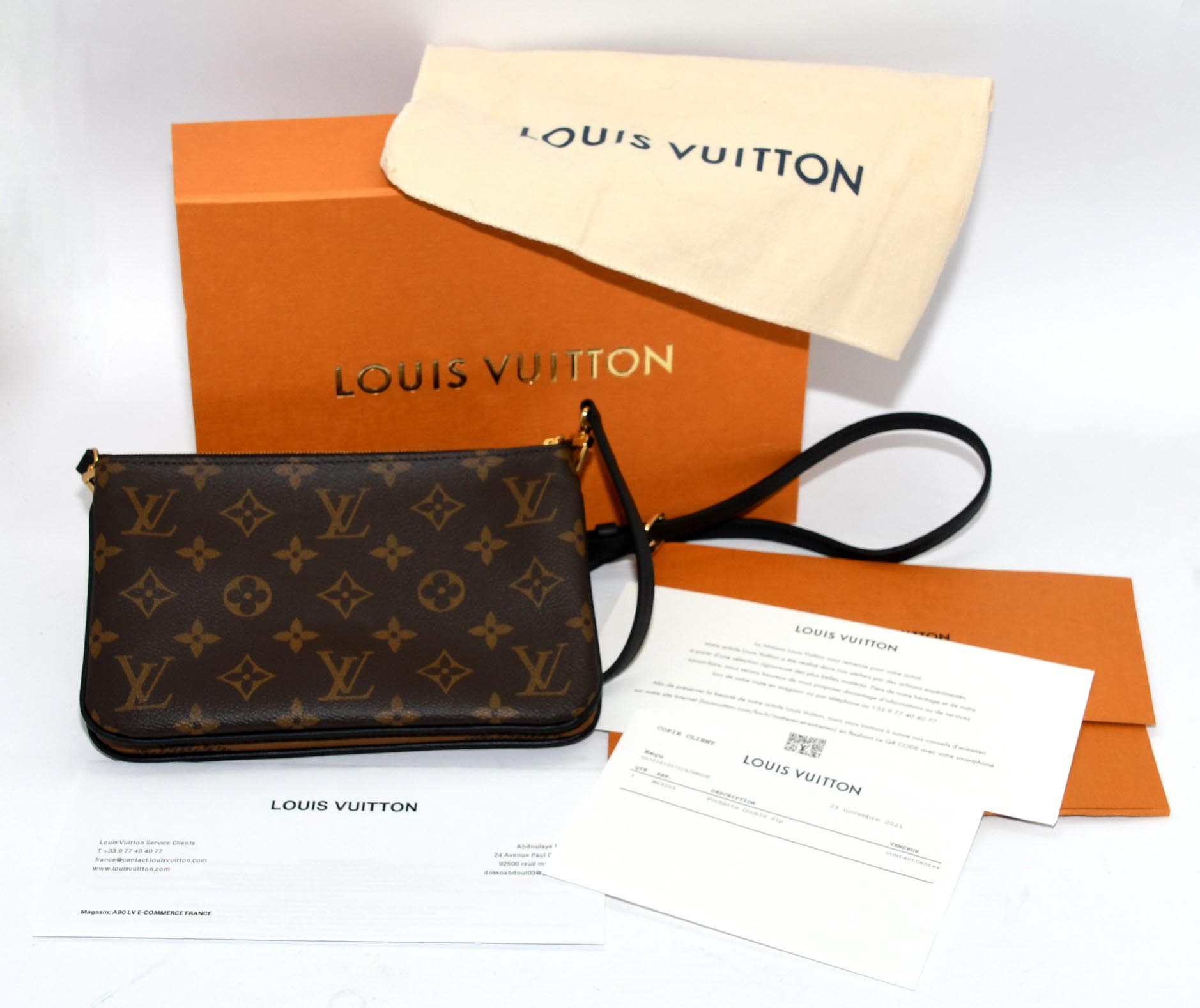 Louis Vuitton Bolso tipo pochette de lona con monograma Accesorios